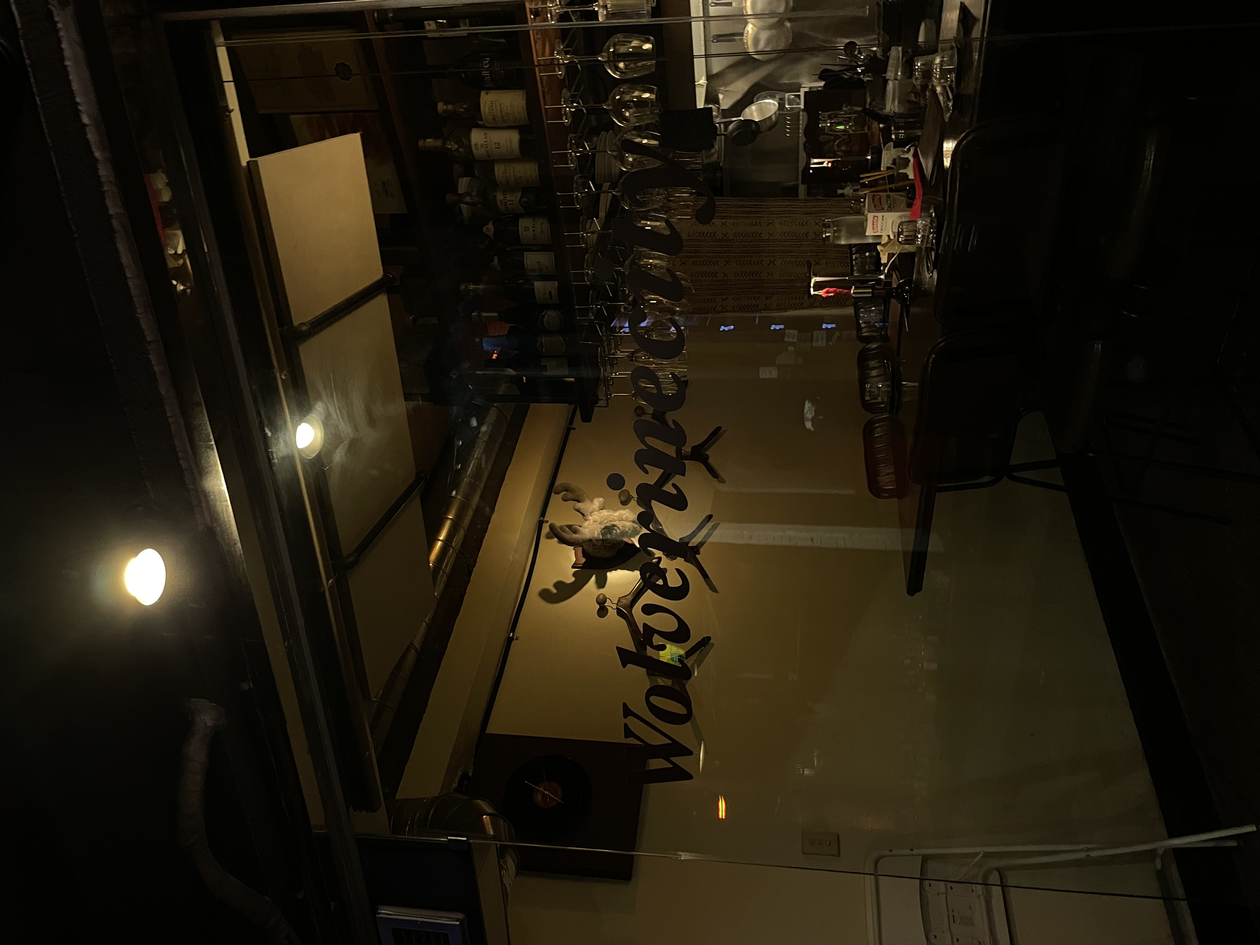 Wolverinecity small bar with cozy pasta-and-wine setup