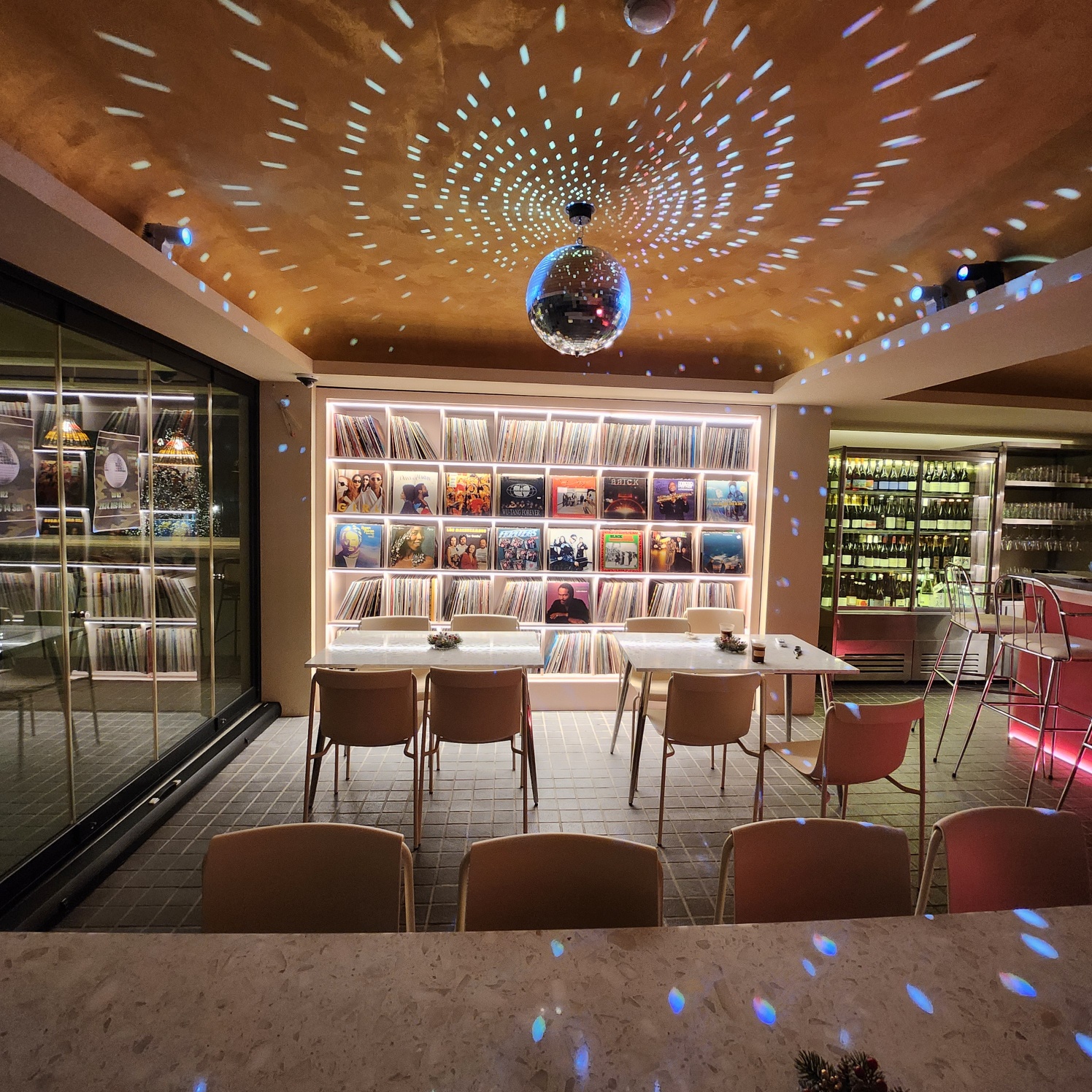Xanadu Record Bar rooftop terrace with skyline and vinyl shelves