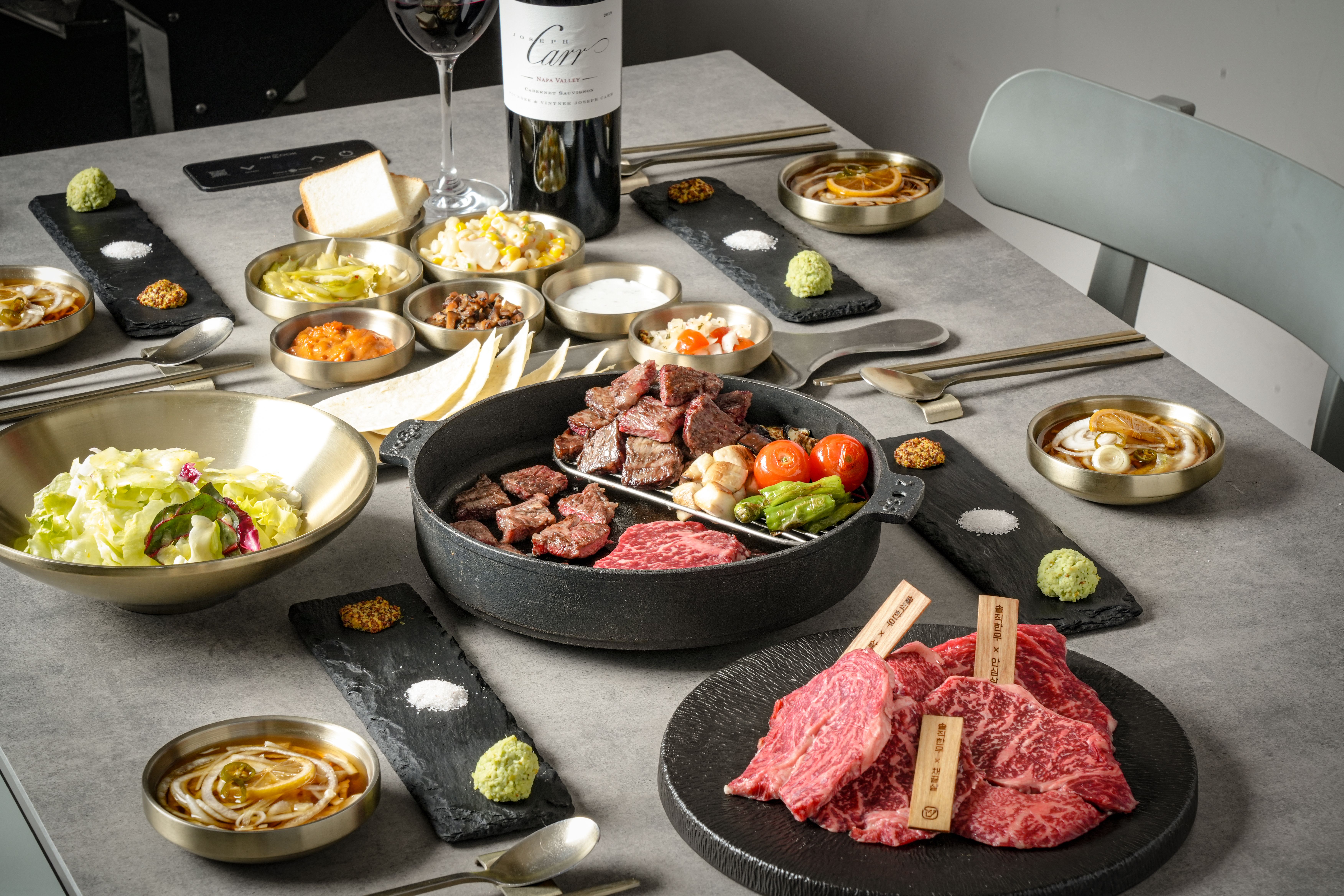 Soljik Hanwoo Oksu cuts displayed with wine fridge and private room