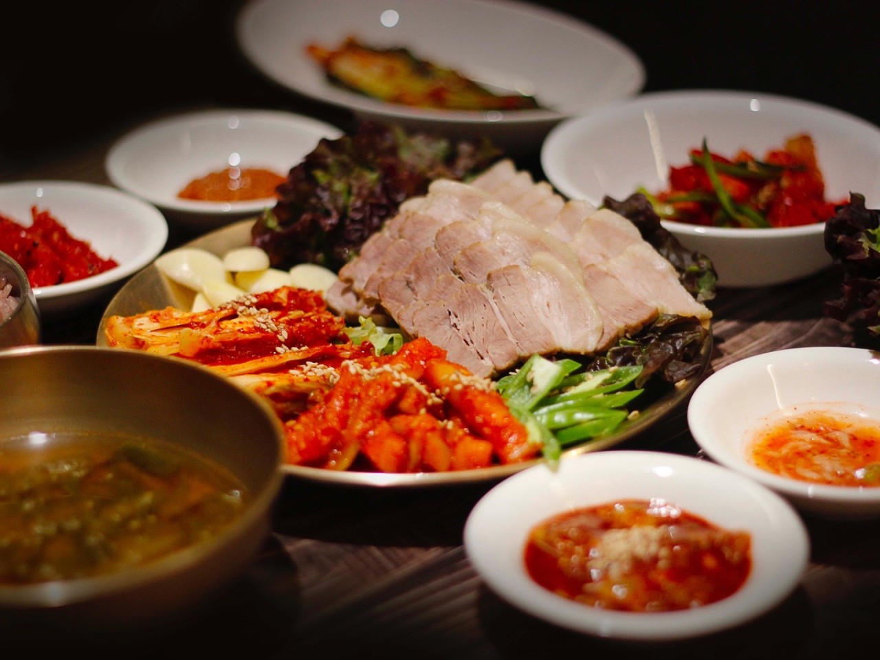 Gujeong Jokbal platter with napa wraps and condiments