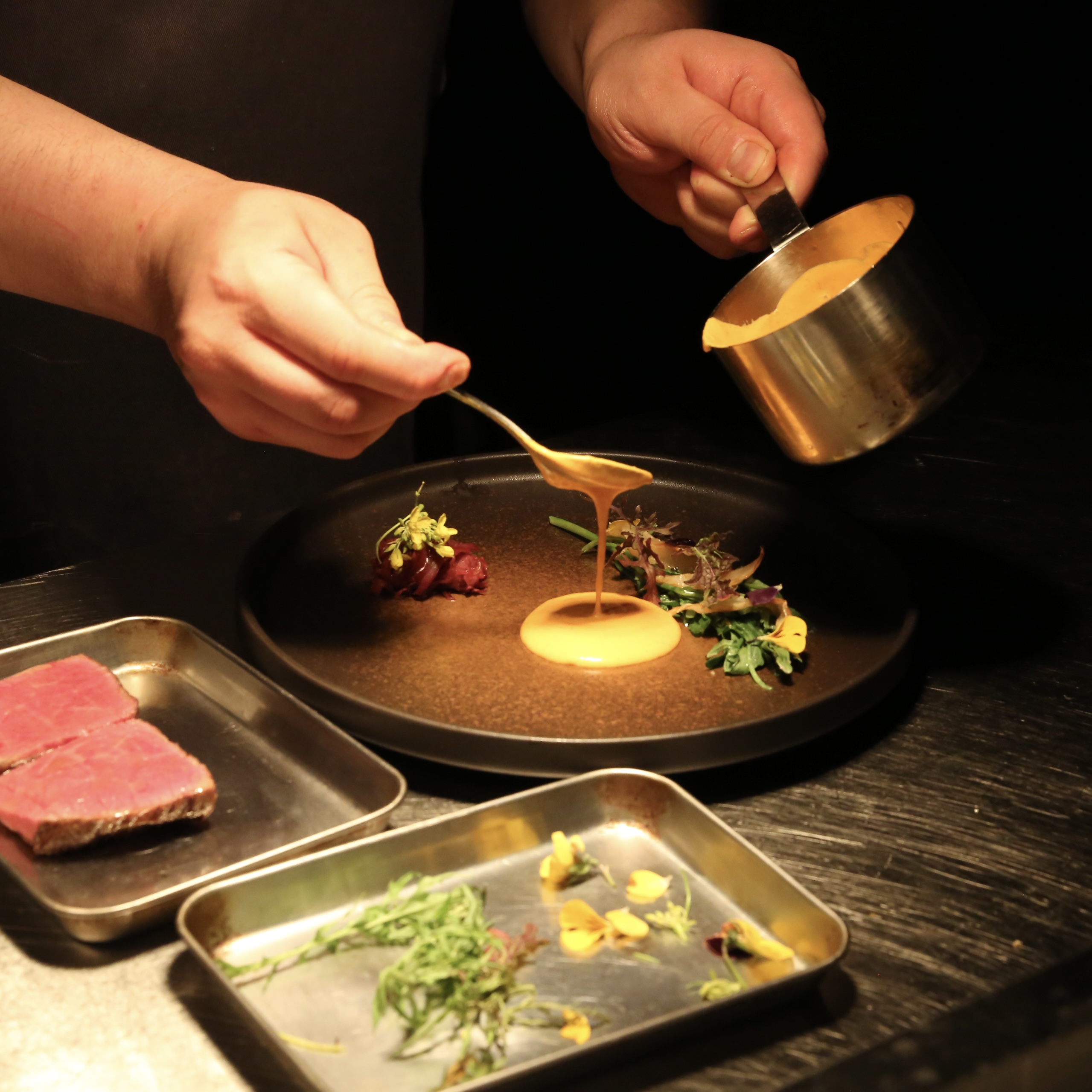 The Eddie course plates at a dining bar in Daebong-dong
