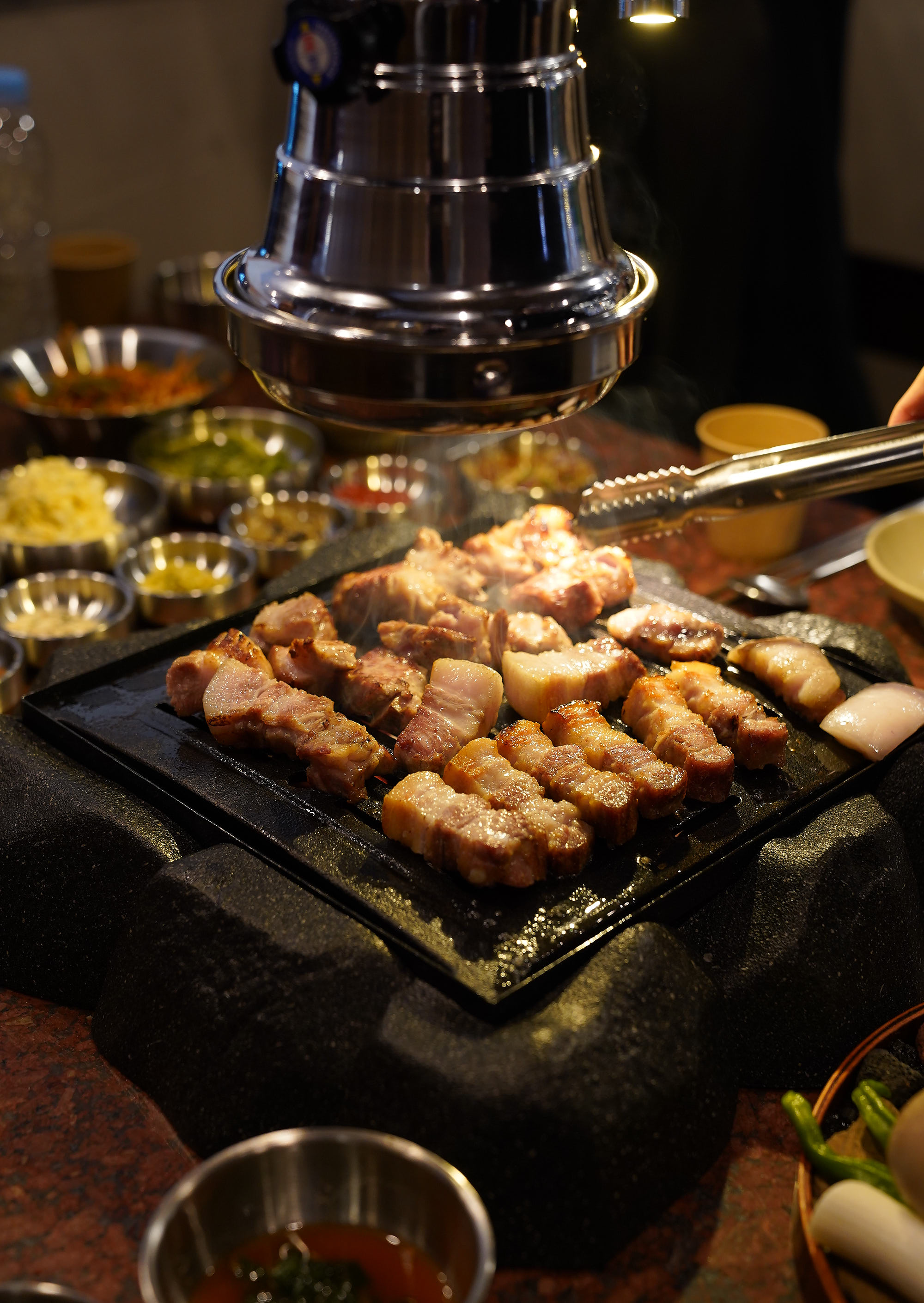 Gubdol Jip cast-iron grill over stone support near City Hall