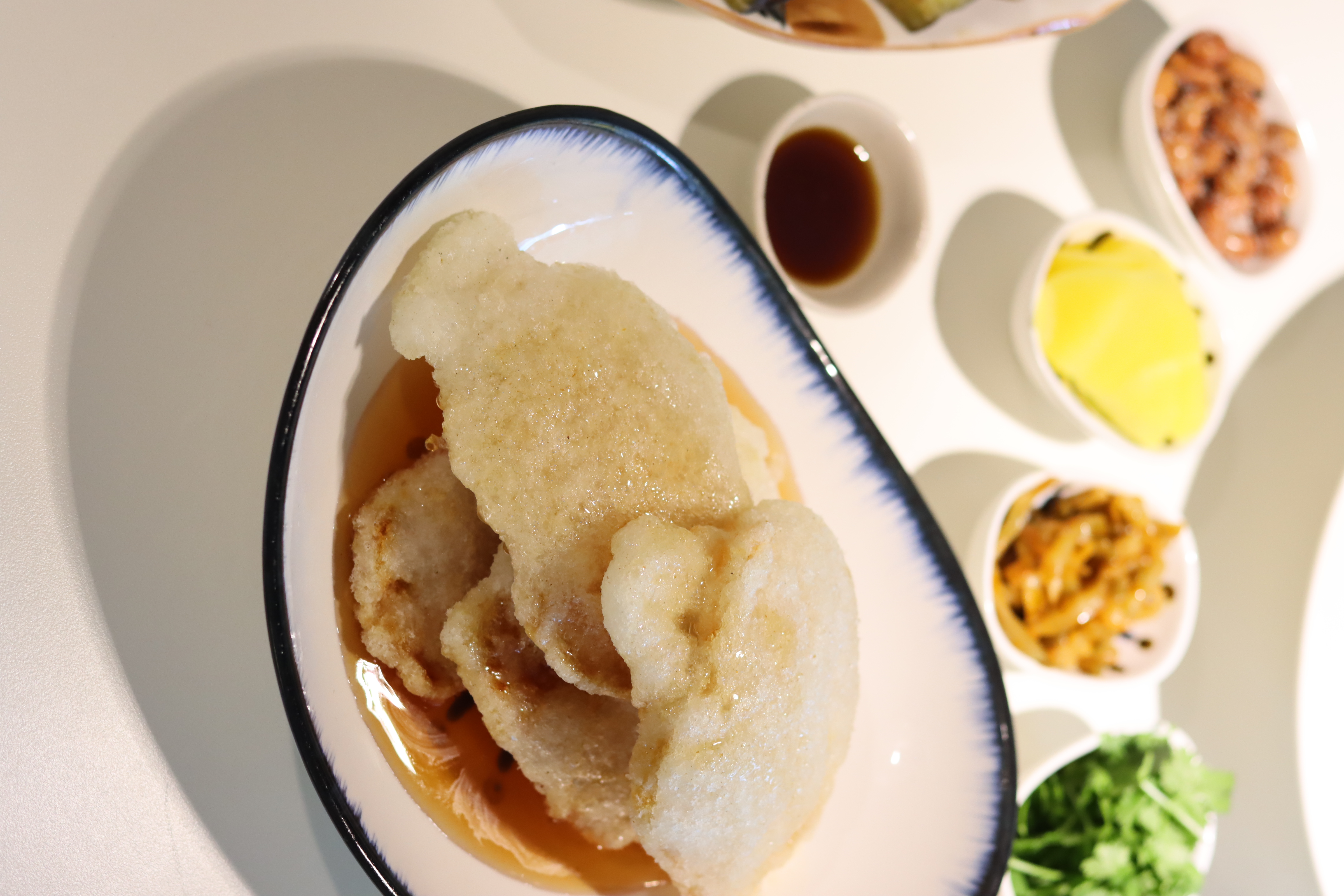 Little Pavilion Chinese dishes plated in a refined Sinsa dining room