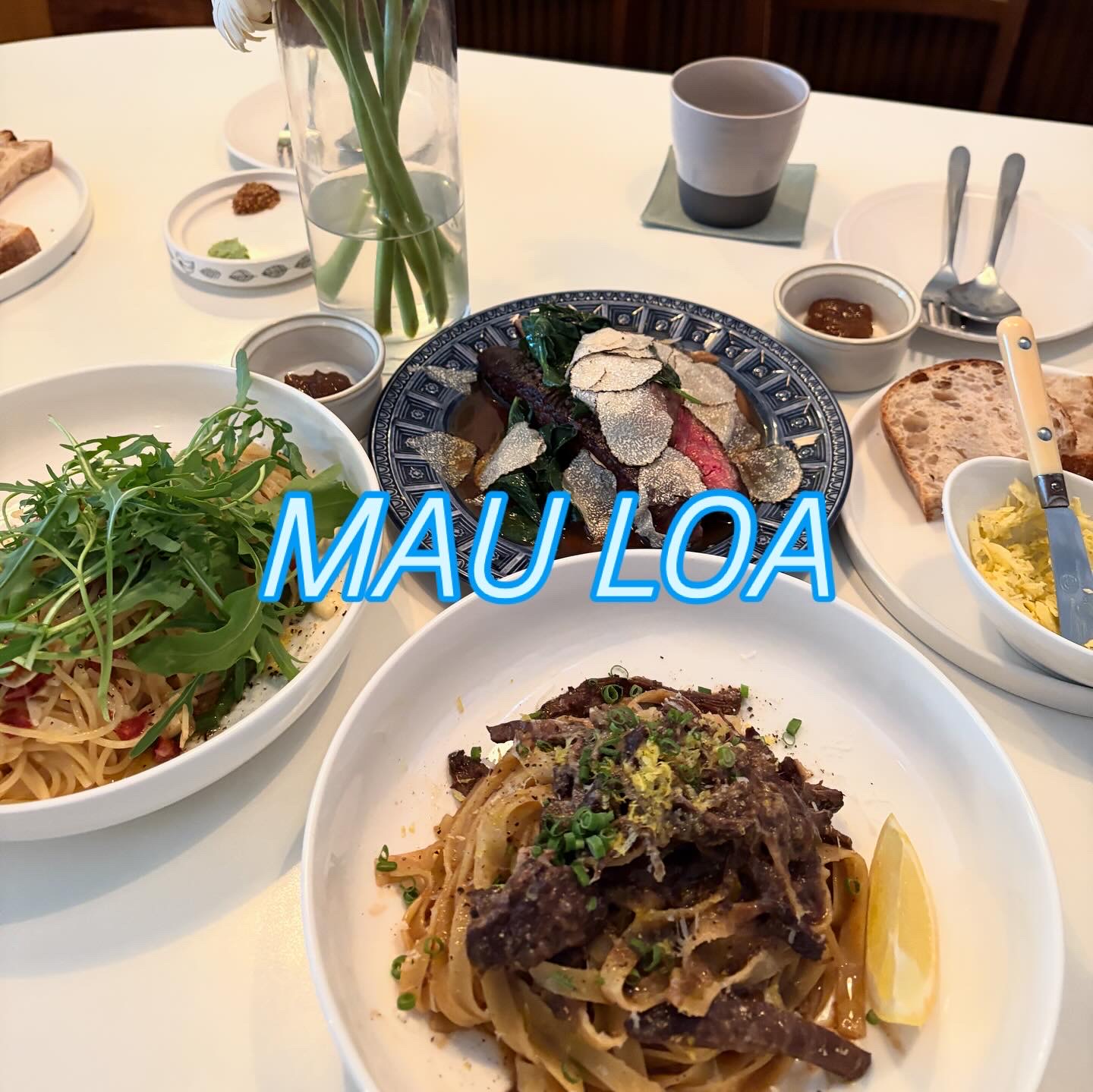 Warm bistro plating and wine at Mauloa