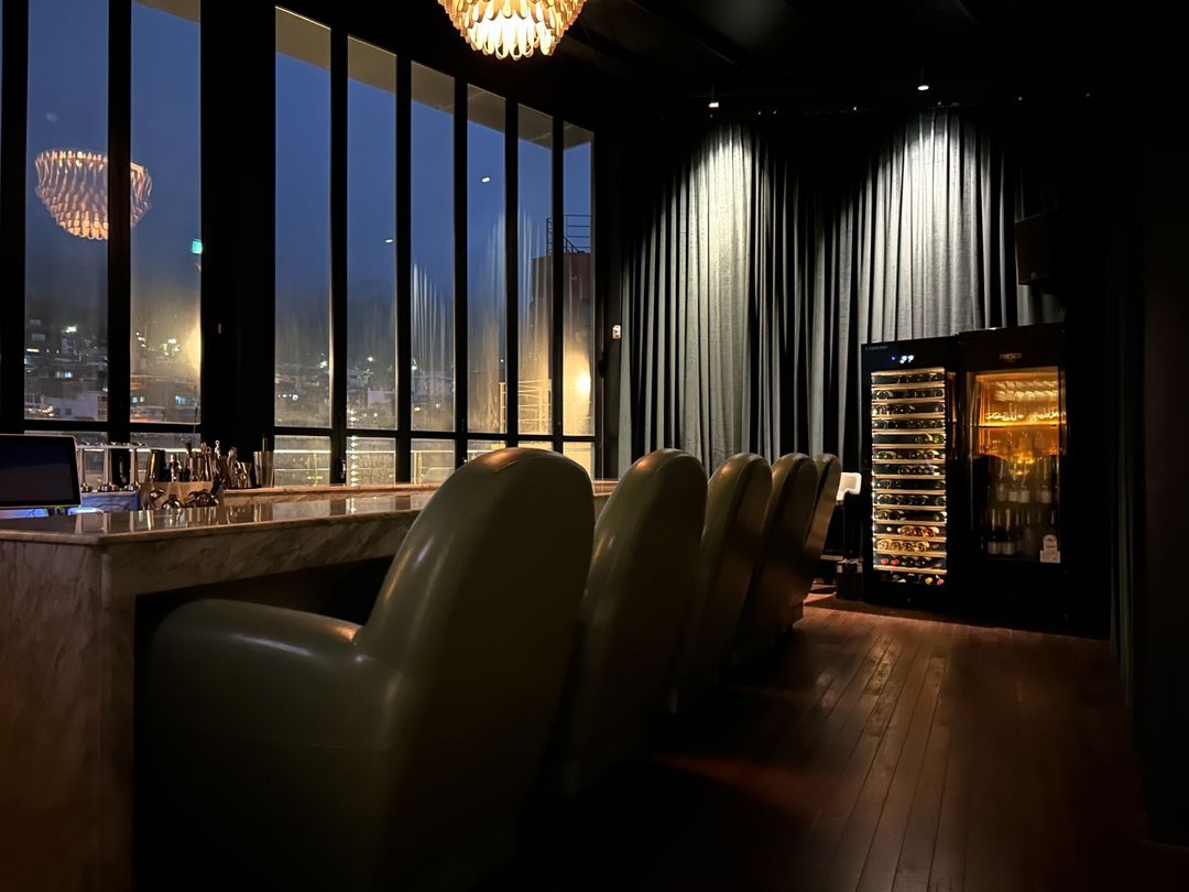 Sunset mood rooftop terrace with Namsan view and champagne