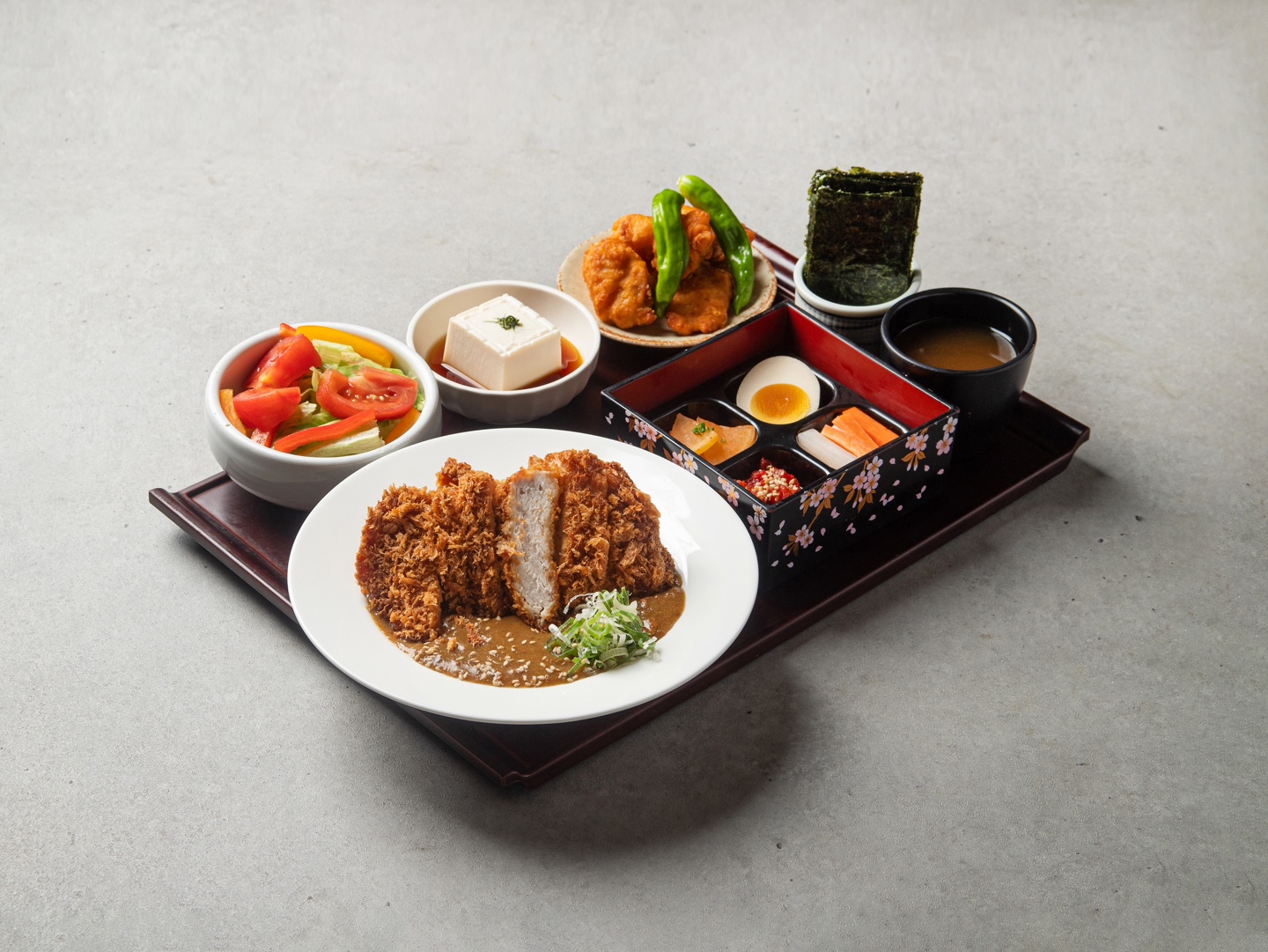 Kome Bento perilla-oil soba set and salmon rice set neatly arranged