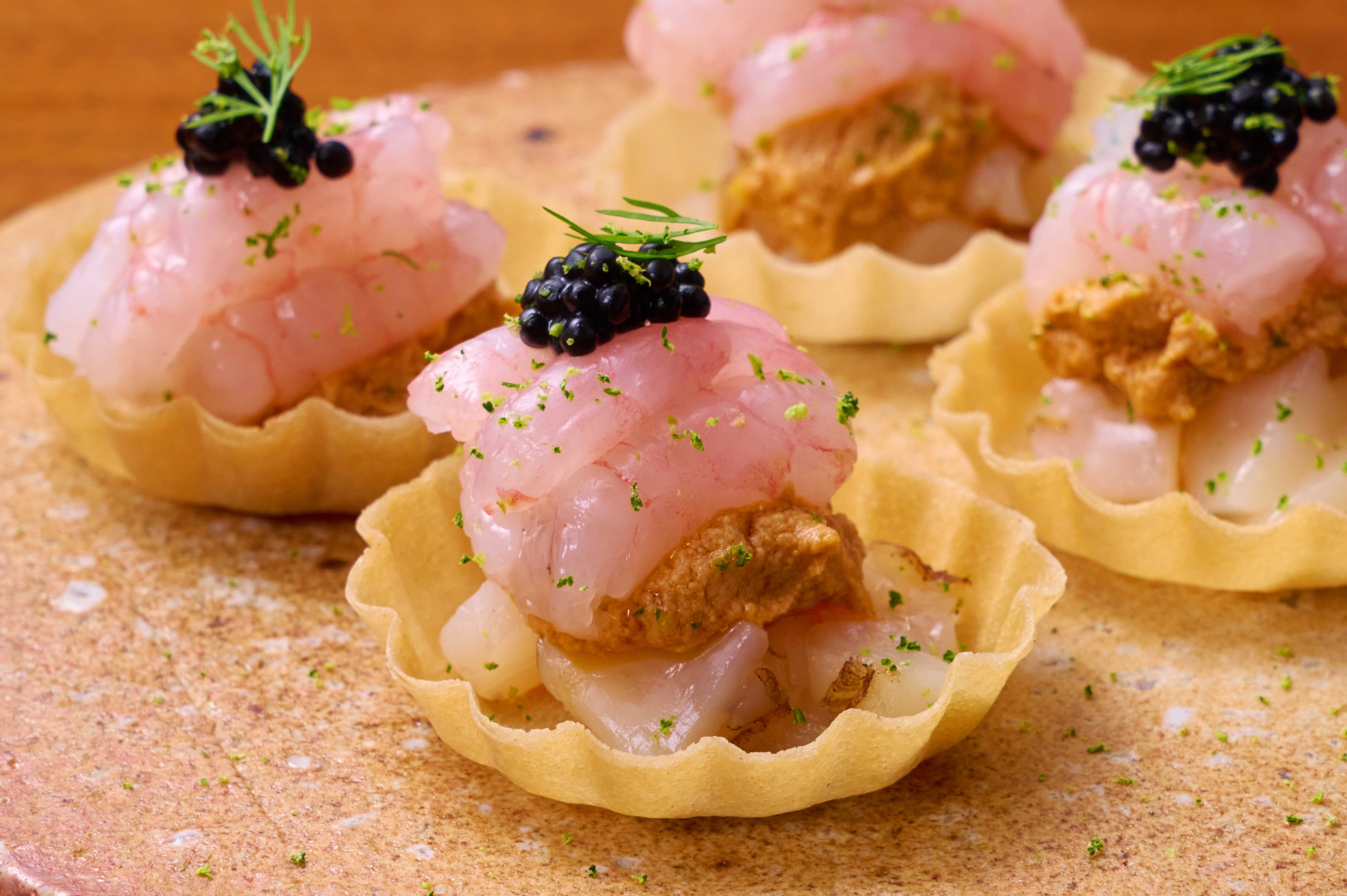 Dining Sangseok omakase counter with seasonal sashimi and sake