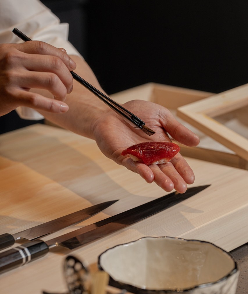 Sushi Hiroaki omakase counter with modern plating