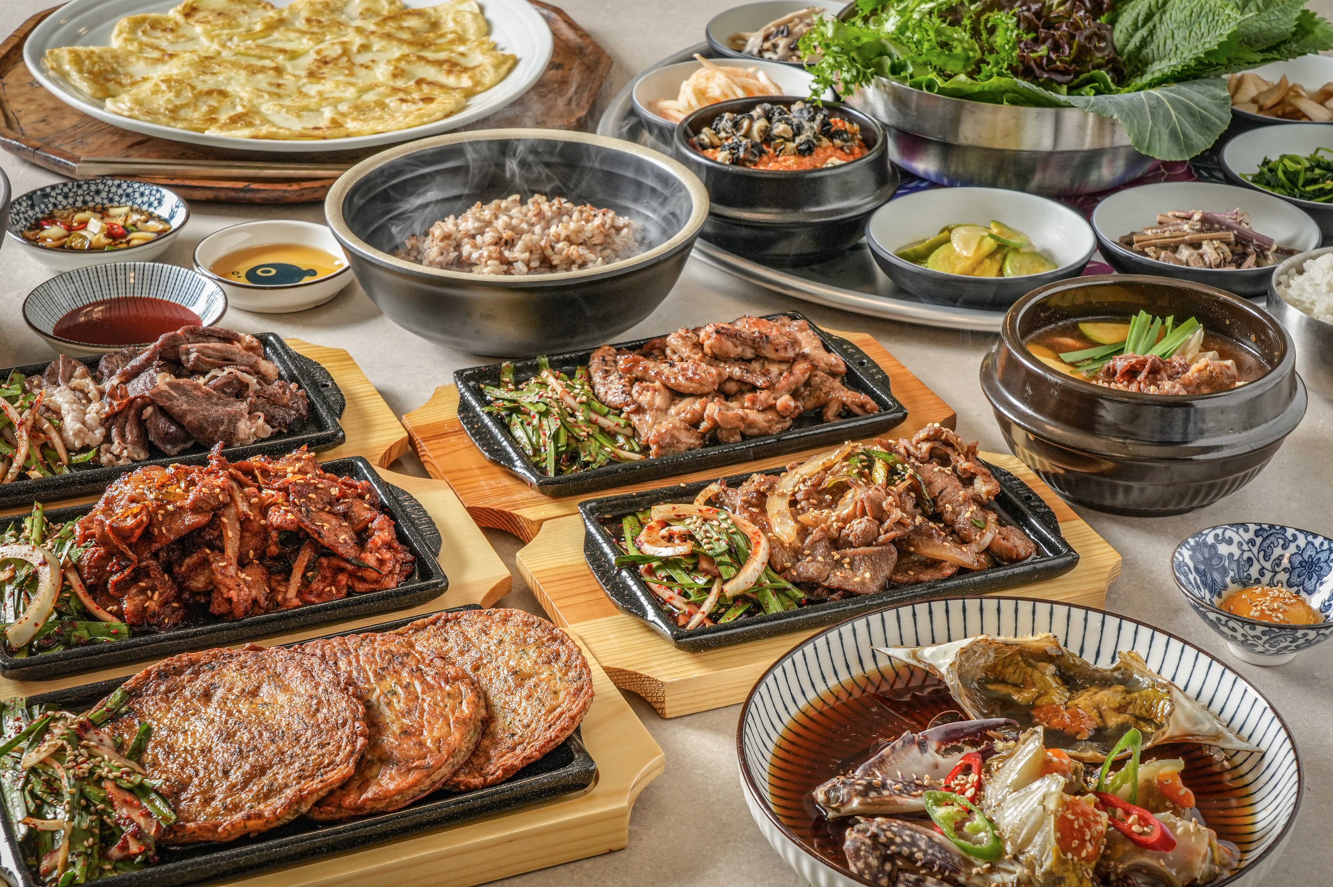 Jigeum Sikdang Mapo seasonal wraps and charcoal grilled pork