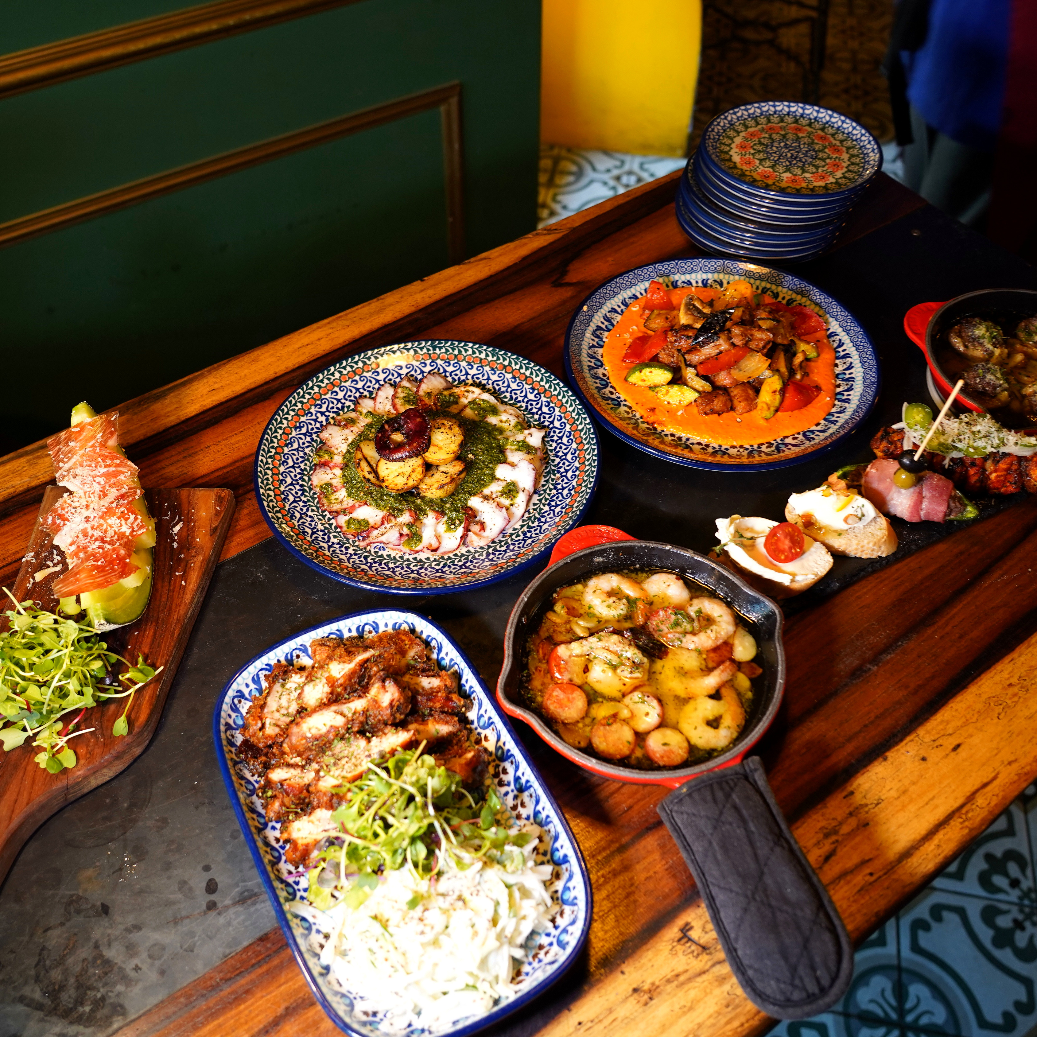 Moon’s Tapa Hannam bar seating with jamon and tapas