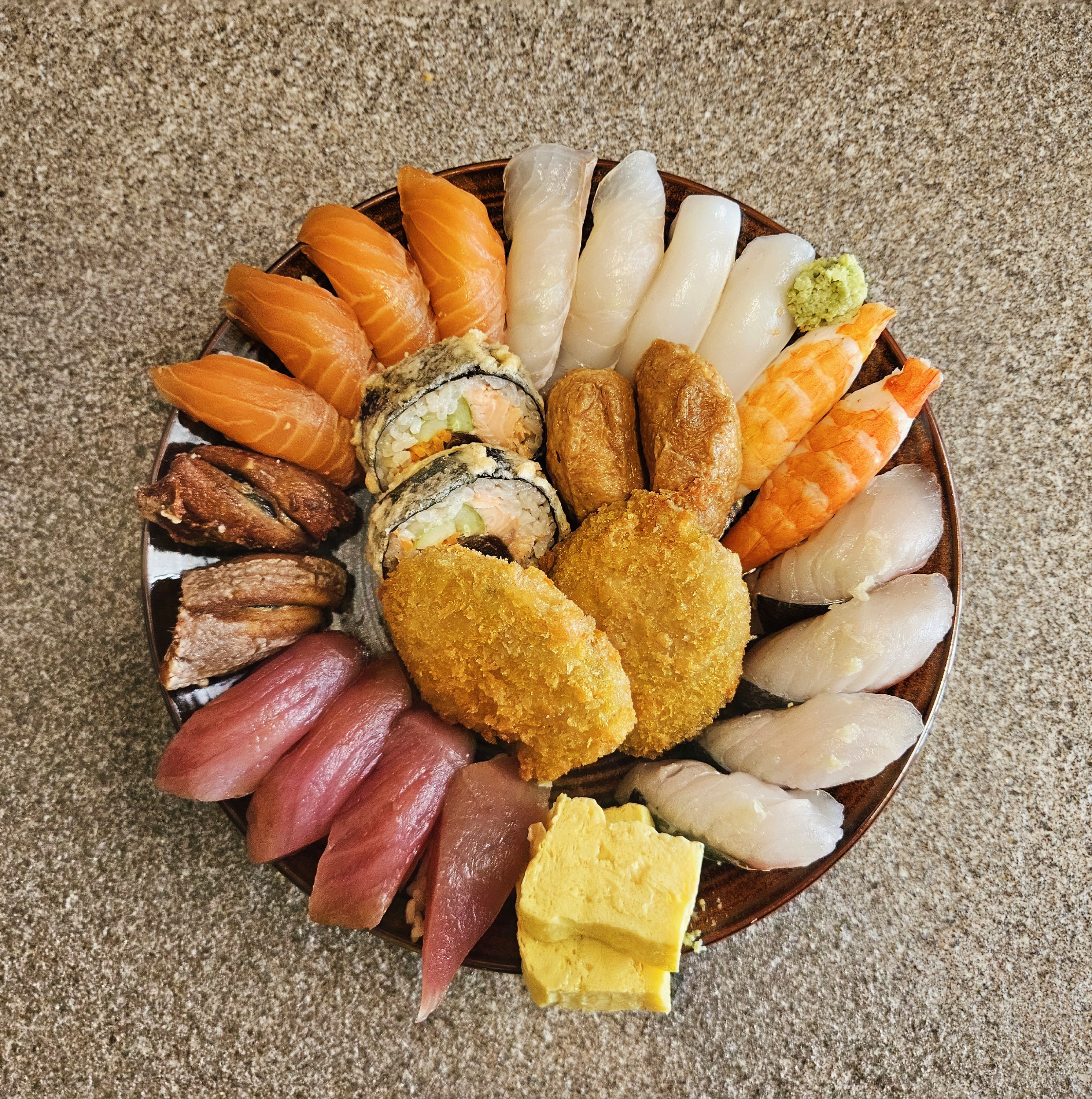 Tesio Sushi counter with aged fish and neatly pressed nigiri