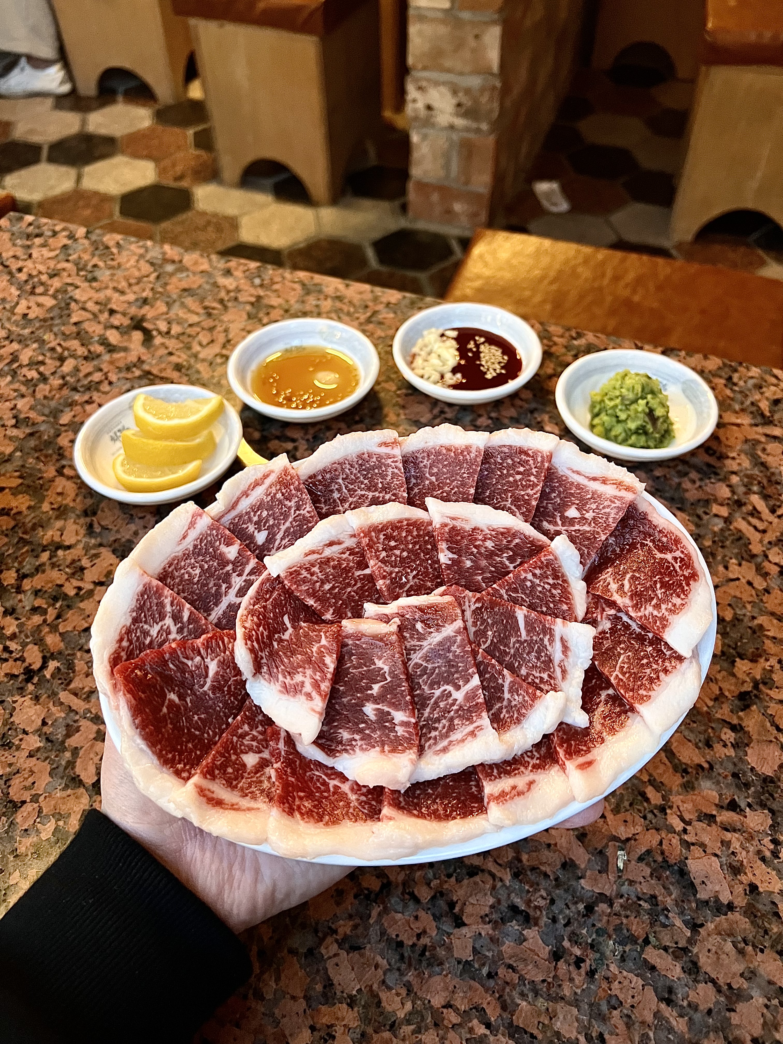 Charyeot chadolbaegi and side dishes neatly plated