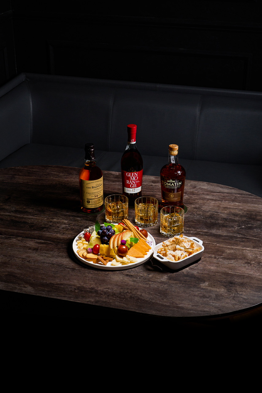 Bar Vier signature cocktails under warm light