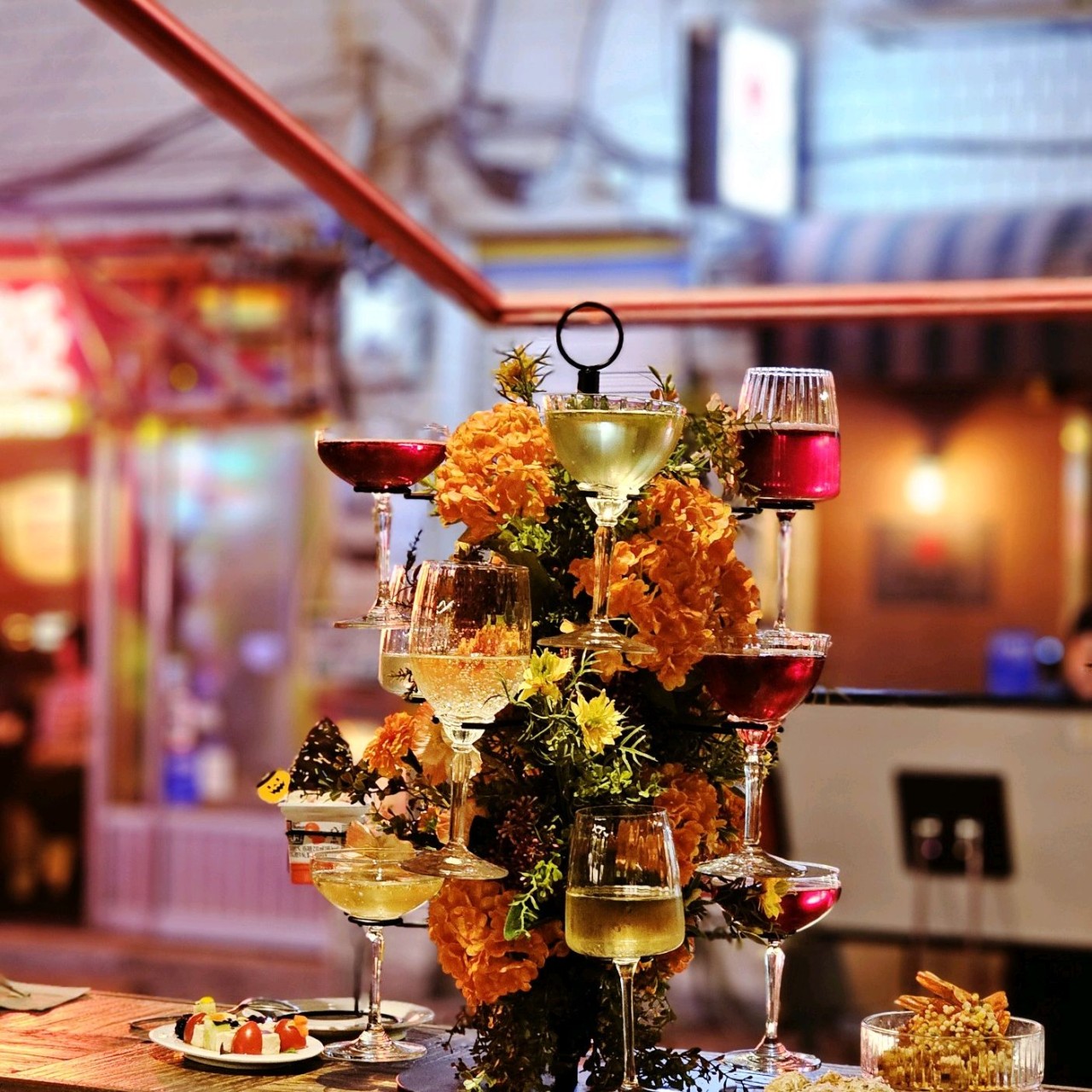 CIAO wine tree and tapas with DJ booth glow