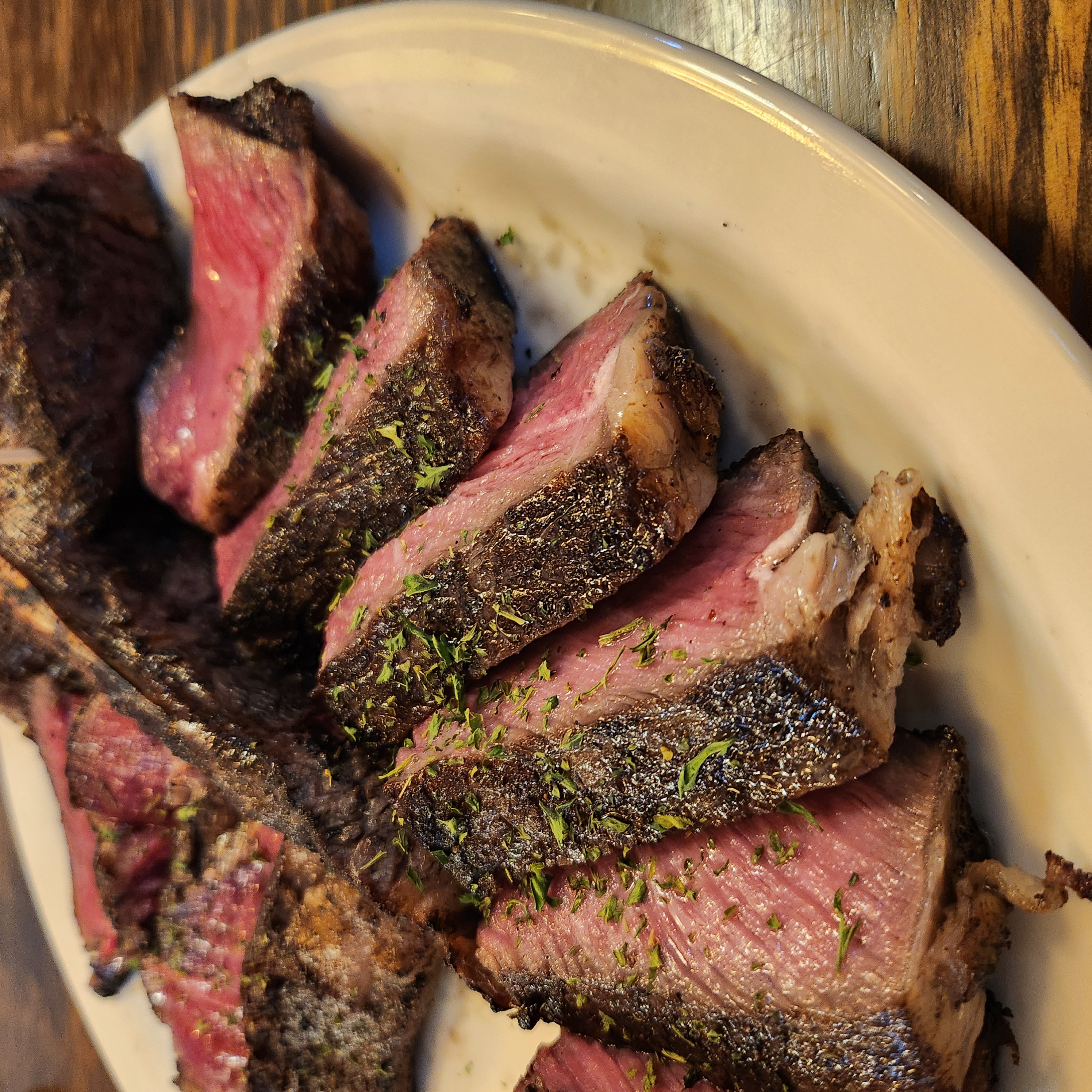 Oak and charcoal-grilled T-bone steak at LOGKEY STEAK