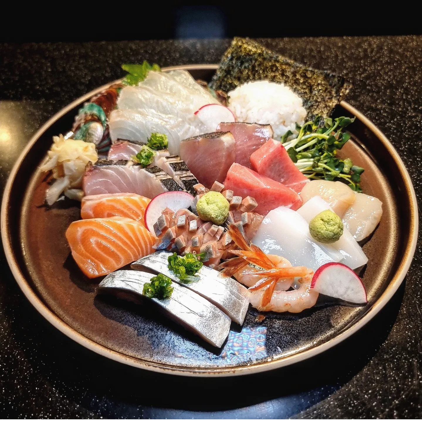 AZITAE izakaya counter with seasonal sashimi and sake