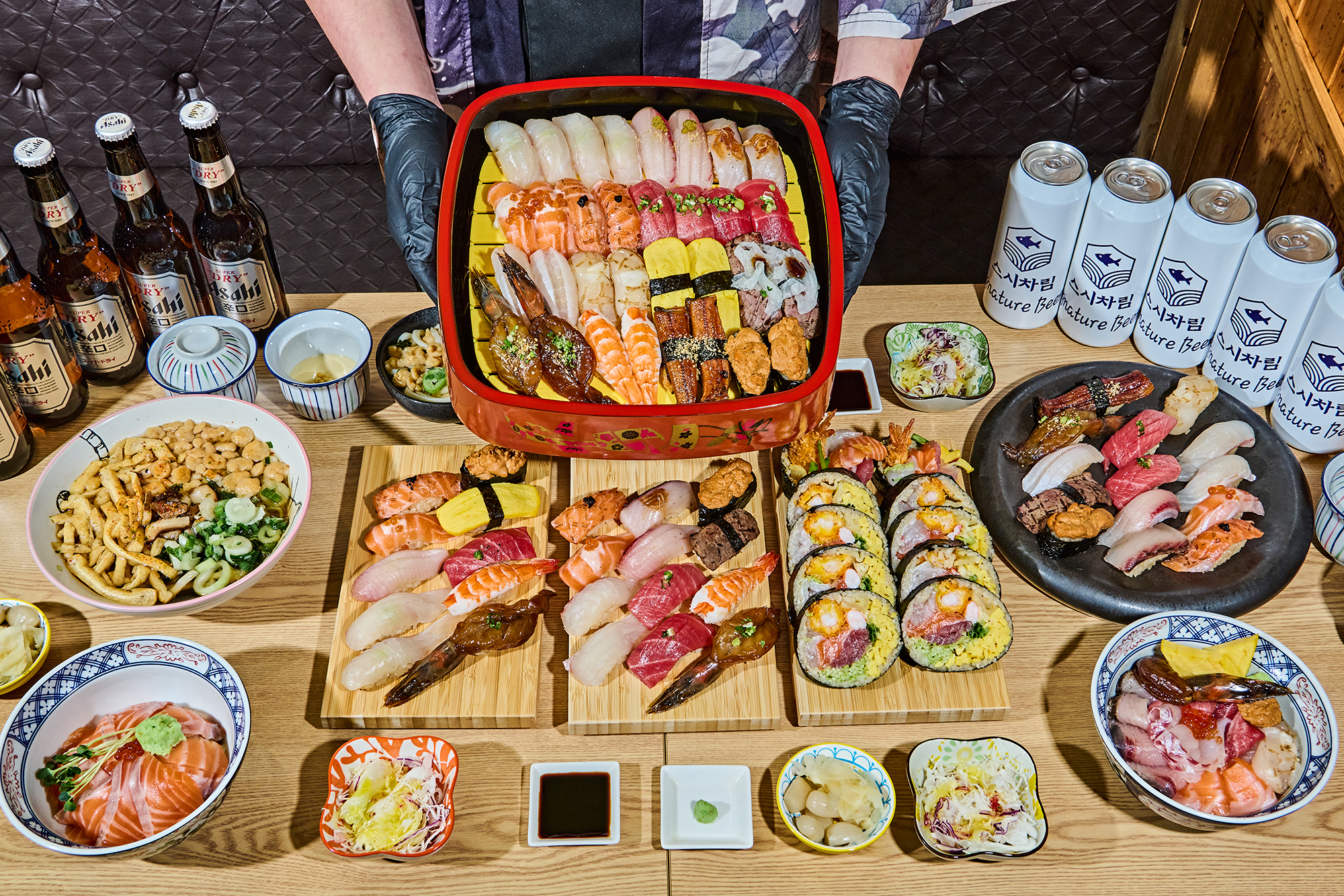 Sushi Chalim chef forming nigiri with seasonal fish
