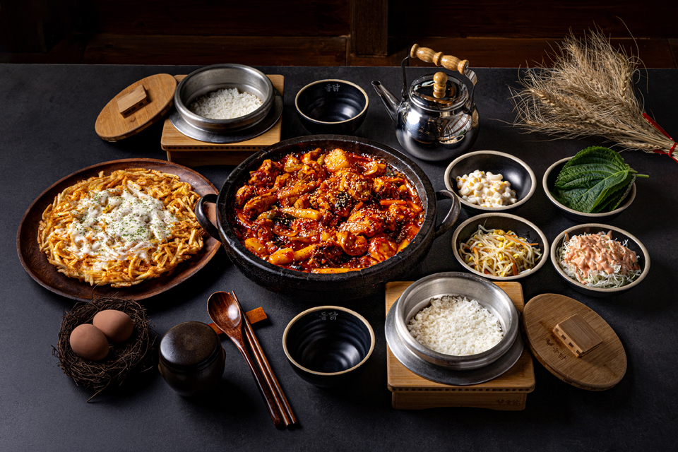 Stone-plate spicy braised chicken bubbling at Doldak Gwangalli