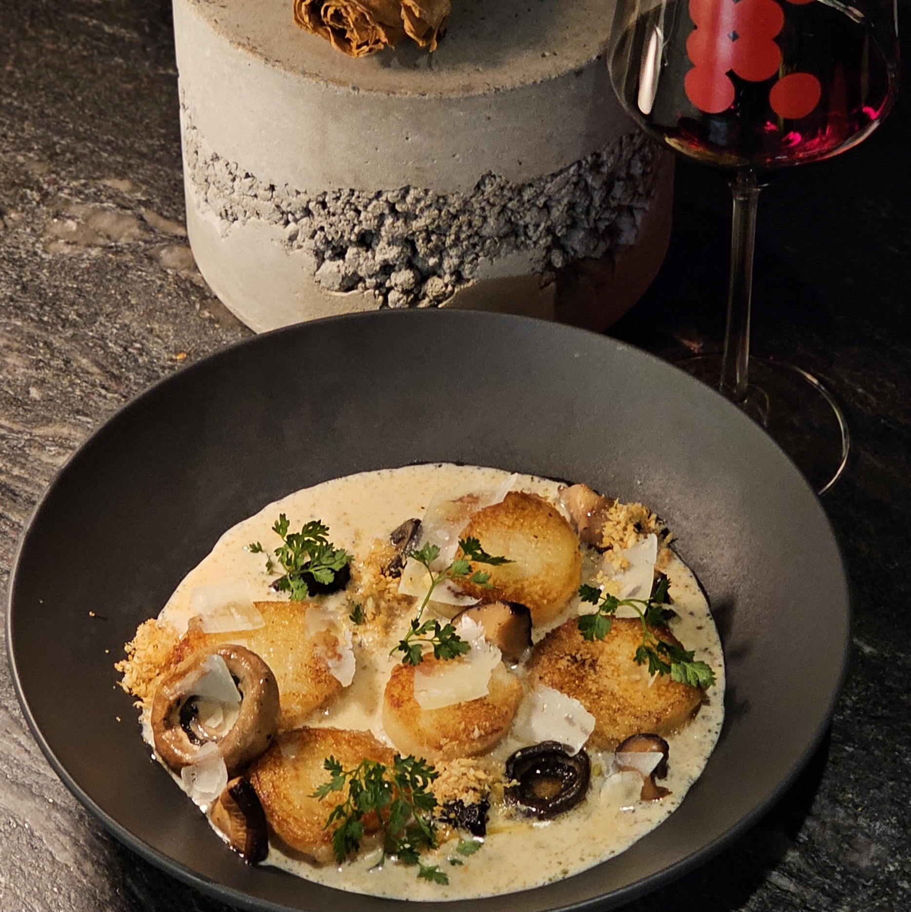 SOAK terrace and moss garden with wine glasses