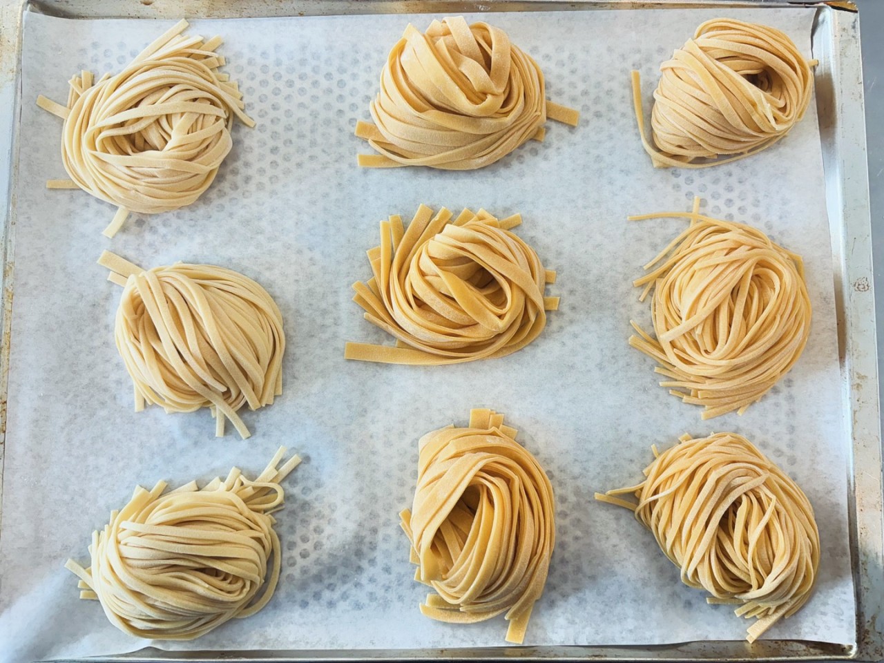 Open kitchen and classic Italian plates at TRATTORIA VERO